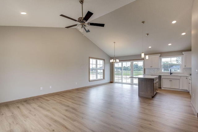 551 Cannondale Ave, Johnstown, OH 43031 - kitchen with light wood-style floors, open floor plan, a center island, recessed lighting, and light countertops