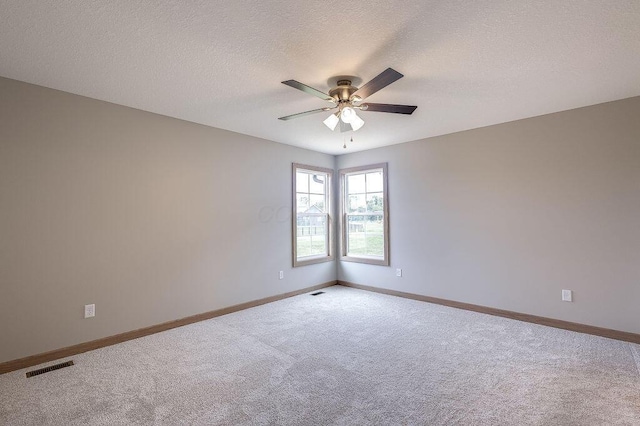 551 Cannondale Ave, Johnstown, OH 43031 - spare room featuring carpet floors, ceiling fan, and a textured ceiling