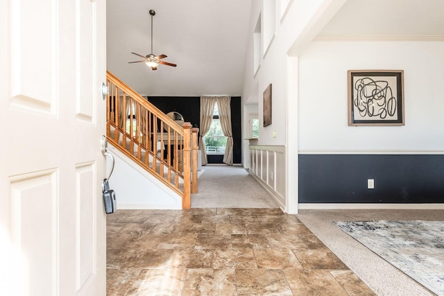 4694 Tayport Ave, Grove City, OH 43123 - entryway with a ceiling fan, stairs, stone finish floors, carpet flooring, and vaulted ceiling