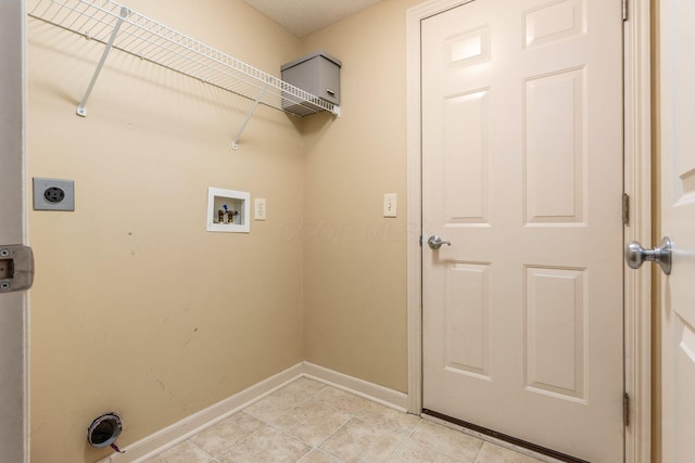 4694 Tayport Ave, Grove City, OH 43123 - laundry area with electric dryer hookup, hookup for a washing machine, and light tile patterned floors