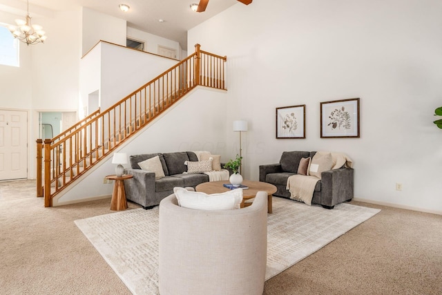 4694 Tayport Ave, Grove City, OH 43123 - carpeted living area featuring a high ceiling, stairs, and a chandelier