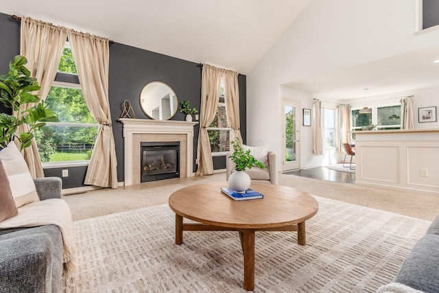 4694 Tayport Ave, Grove City, OH 43123 - carpeted living area featuring a fireplace and high vaulted ceiling