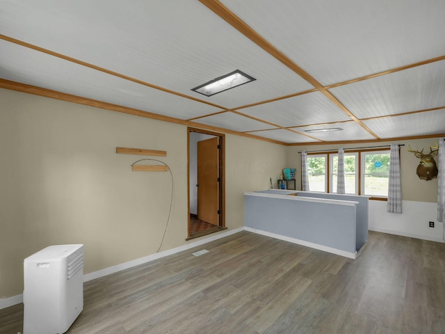1018 Harrison Ave, Lancaster, OH 43130 - unfurnished living room featuring wood finished floors and baseboards