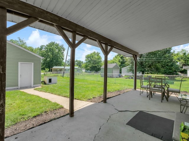 1018 Harrison Ave, Lancaster, OH 43130 - fenced backyard with a patio area