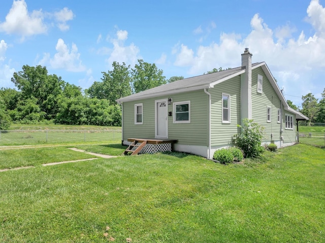 1018 Harrison Ave, Lancaster, OH 43130 - back of house with a chimney