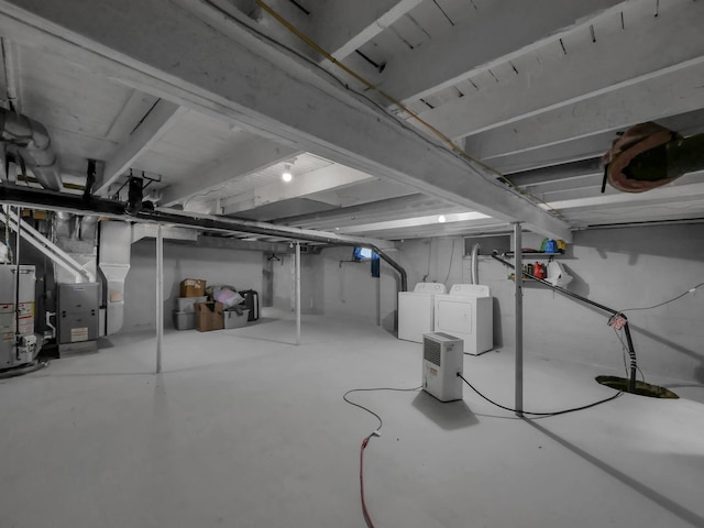 1018 Harrison Ave, Lancaster, OH 43130 - unfinished basement with water heater, washing machine and clothes dryer, and heating unit