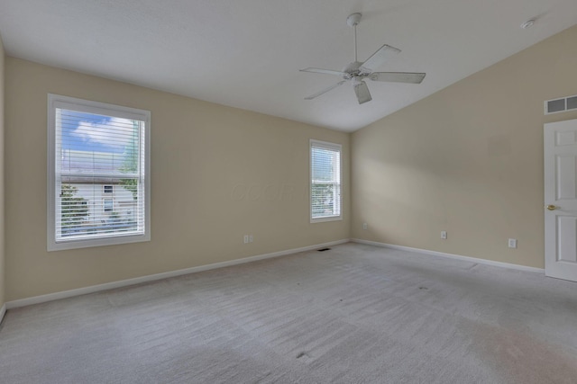 7511 Windsor Dr, Dublin, OH 43016 - spare room with vaulted ceiling, light carpet, ceiling fan, and a smoke detector