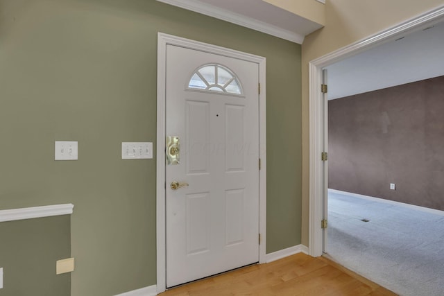 7511 Windsor Dr, Dublin, OH 43016 - foyer entrance featuring light wood-style floors and ornamental molding