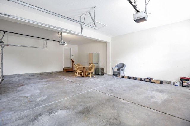 7511 Windsor Dr, Dublin, OH 43016 - garage with a garage door opener