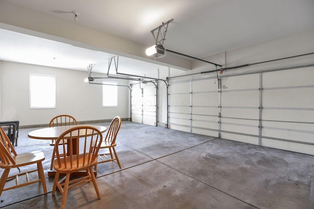 7511 Windsor Dr, Dublin, OH 43016 - garage featuring a garage door opener