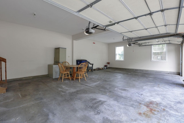 7511 Windsor Dr, Dublin, OH 43016 - garage featuring a garage door opener