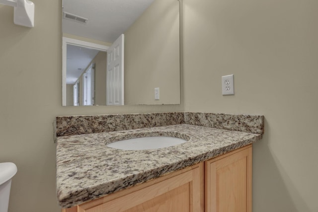 7511 Windsor Dr, Dublin, OH 43016 - bathroom featuring vanity and toilet