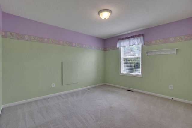 7511 Windsor Dr, Dublin, OH 43016 - carpeted spare room with baseboards
