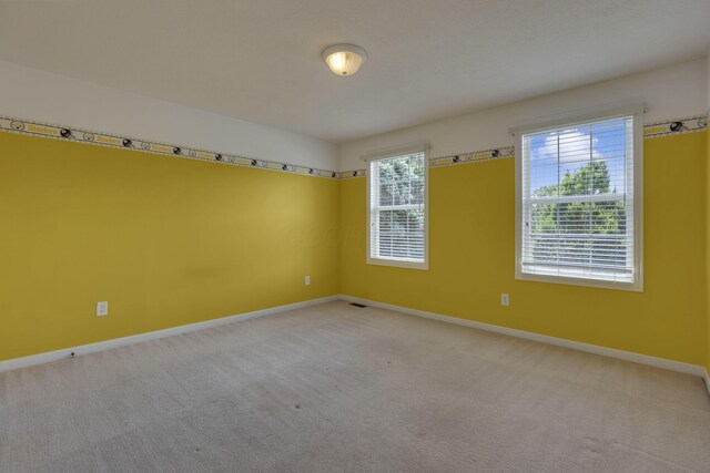7511 Windsor Dr, Dublin, OH 43016 - carpeted spare room with baseboards