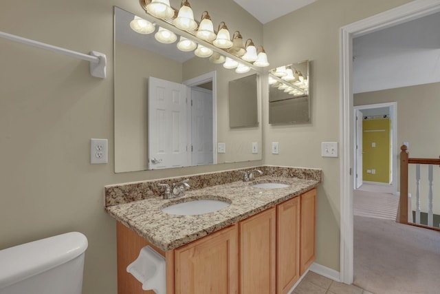 7511 Windsor Dr, Dublin, OH 43016 - bathroom featuring double vanity and tile patterned floors