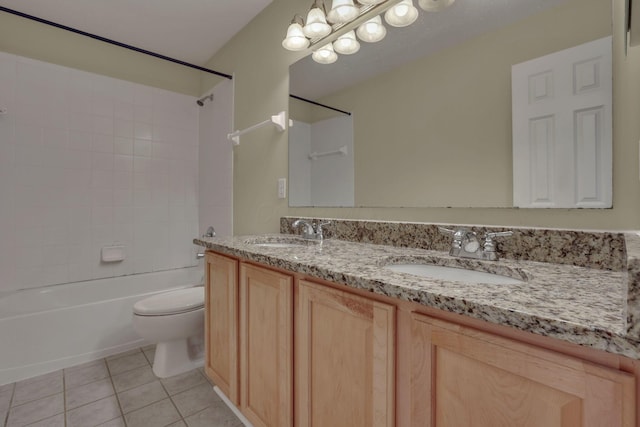 7511 Windsor Dr, Dublin, OH 43016 - bathroom featuring shower / bathtub combination, double vanity, and tile patterned flooring