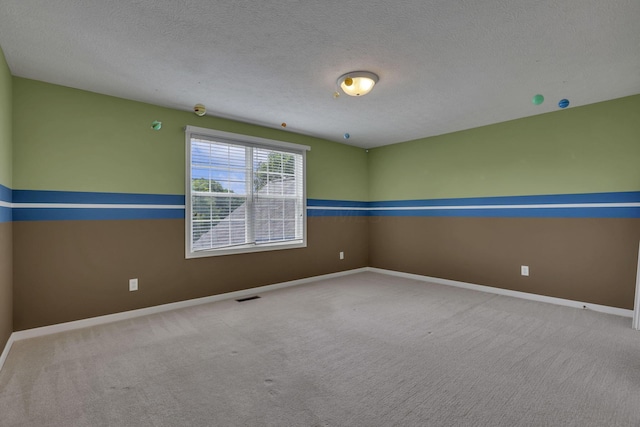 7511 Windsor Dr, Dublin, OH 43016 - empty room with carpet floors and a textured ceiling