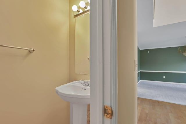 7511 Windsor Dr, Dublin, OH 43016 - bathroom with wood finished floors and ornamental molding