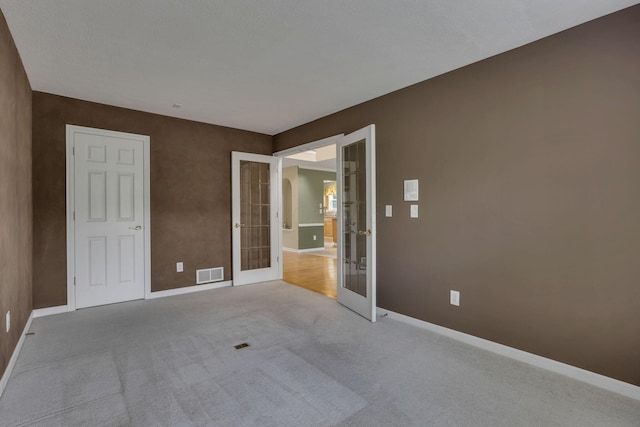 7511 Windsor Dr, Dublin, OH 43016 - carpeted spare room featuring french doors and baseboards