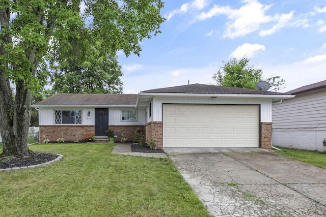 3171 Haskell Dr, Columbus, OH 43219 - ranch-style house with brick siding, concrete driveway, an attached garage, and a front lawn