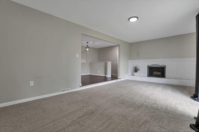 3171 Haskell Dr, Columbus, OH 43219 - unfurnished living room with carpet flooring and a fireplace