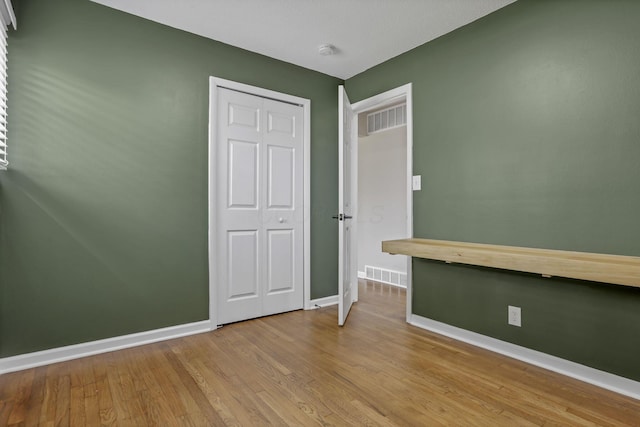 3171 Haskell Dr, Columbus, OH 43219 - spare room with a smoke detector and wood finished floors