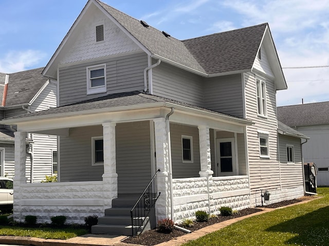 566 Maple Ave, Newark, OH 43055 - view of front of property featuring a porch and a shingled roof