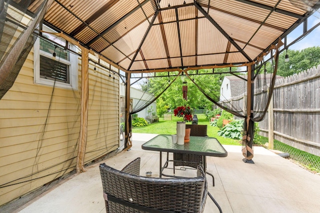 115 Maple Ave, Utica, OH 43080 - fenced backyard with a gazebo and a patio area