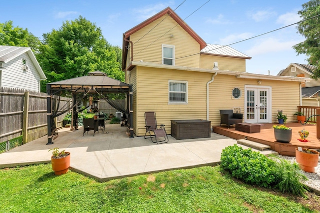 115 Maple Ave, Utica, OH 43080 - rear view of house with french doors, a wooden deck, an outdoor living space, a fenced backyard, and a gazebo