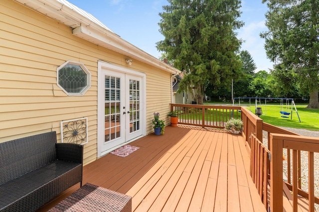 115 Maple Ave, Utica, OH 43080 - deck featuring a playground, french doors, and a lawn