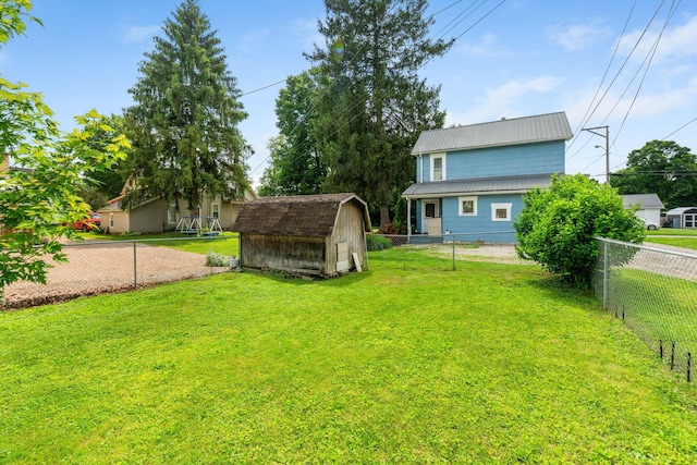 115 Maple Ave, Utica, OH 43080 - fenced backyard featuring a shed