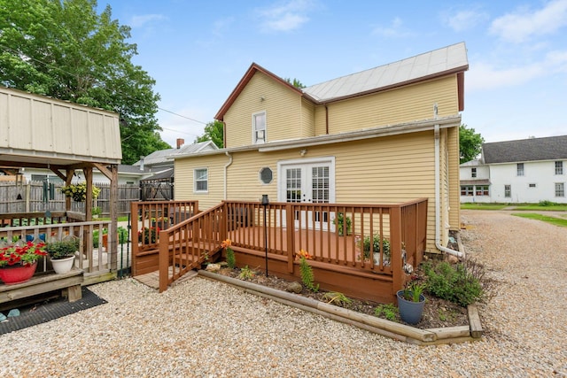 115 Maple Ave, Utica, OH 43080 - rear view of house with a wooden deck, a metal roof, and french doors