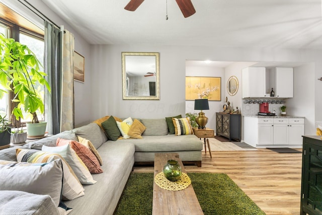 115 Maple Ave, Utica, OH 43080 - living room with a ceiling fan and light wood-style floors