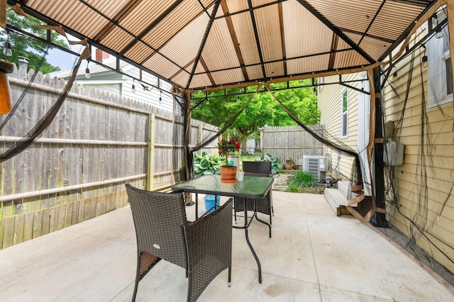115 Maple Ave, Utica, OH 43080 - view of patio featuring a gazebo, outdoor dining space, and entry steps