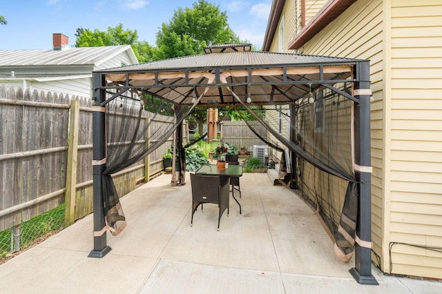 115 Maple Ave, Utica, OH 43080 - fenced backyard with a gazebo, a patio, and outdoor dining space