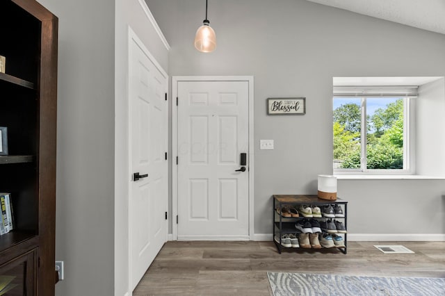 7838 Kiowa Way, Columbus, OH 43085 - entryway with wood finished floors and lofted ceiling