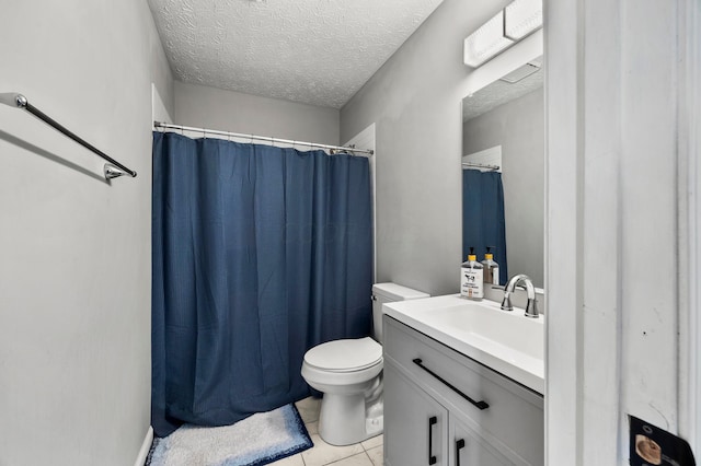 7838 Kiowa Way, Columbus, OH 43085 - bathroom with vanity, tile patterned flooring, a textured ceiling, and a shower with shower curtain