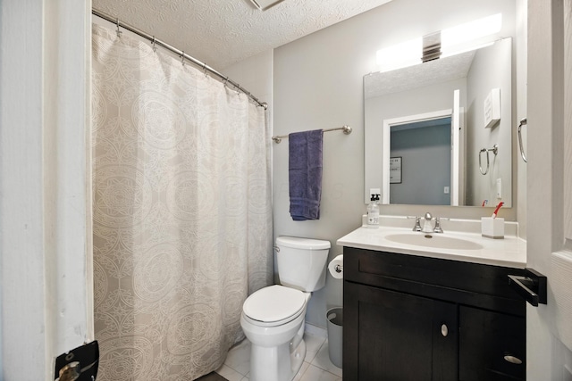 7838 Kiowa Way, Columbus, OH 43085 - bathroom featuring a textured ceiling, vanity, and tile patterned floors