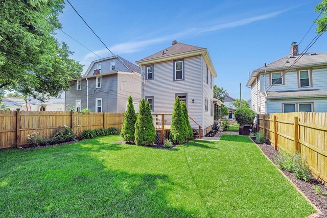 520 E Jenkins Ave, Columbus, OH 43207 - back of house with a fenced backyard