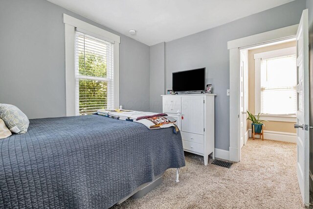 520 E Jenkins Ave, Columbus, OH 43207 - carpeted bedroom with multiple windows
