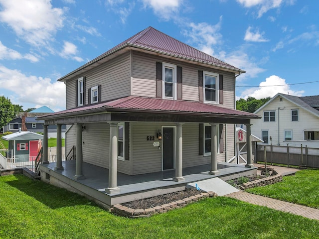 522 S Main St, New Lexington, OH 43764 - rear view of property with a porch and a metal roof
