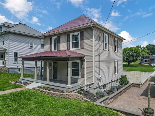 522 S Main St, New Lexington, OH 43764 - view of front of house with covered porch and a metal roof