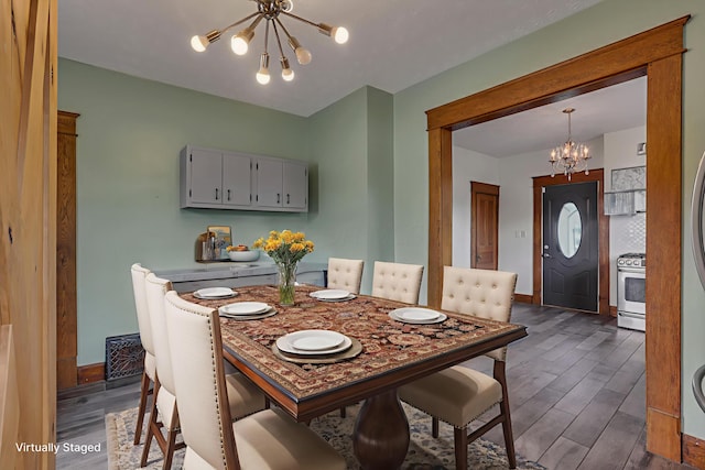 522 S Main St, New Lexington, OH 43764 - dining room with a chandelier and dark wood-type flooring
