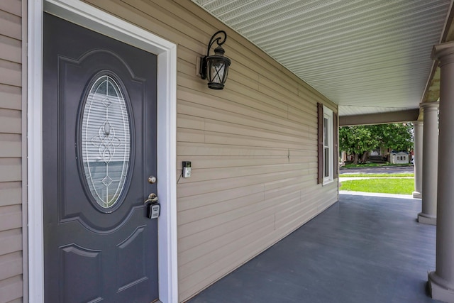 522 S Main St, New Lexington, OH 43764 - doorway to property with covered porch
