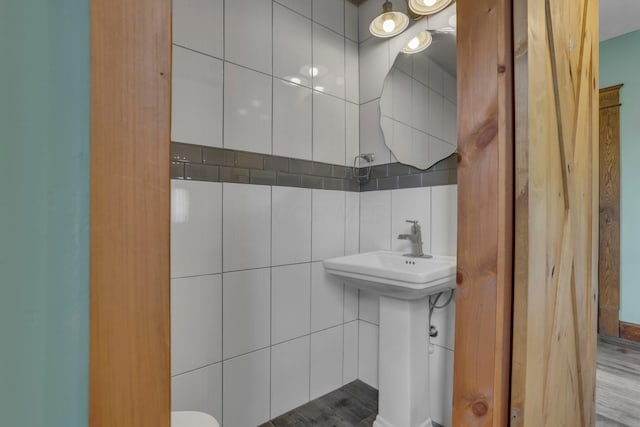 522 S Main St, New Lexington, OH 43764 - bathroom featuring tile walls and toilet
