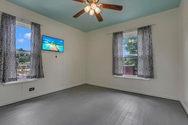 522 S Main St, New Lexington, OH 43764 - unfurnished room featuring plenty of natural light, wood finished floors, and ceiling fan