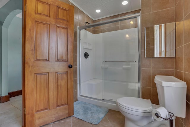 522 S Main St, New Lexington, OH 43764 - bathroom featuring a shower stall, tile patterned flooring, and recessed lighting