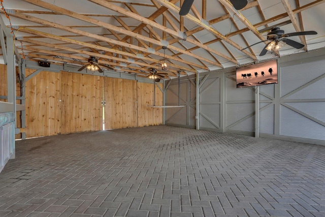 522 S Main St, New Lexington, OH 43764 - garage featuring ceiling fan and wooden walls