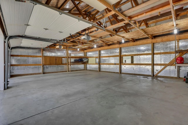 522 S Main St, New Lexington, OH 43764 - garage featuring a garage door opener