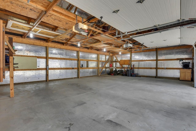 522 S Main St, New Lexington, OH 43764 - garage featuring a garage door opener